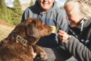 Pet-owner-comforting-anxious-dog